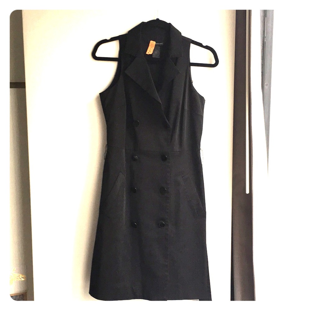 Sleeveless double breasted trench coat dress